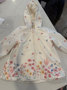 Little Me Cream Hooded Floral Raincoat with Pink, Blue & Yellow Flowers